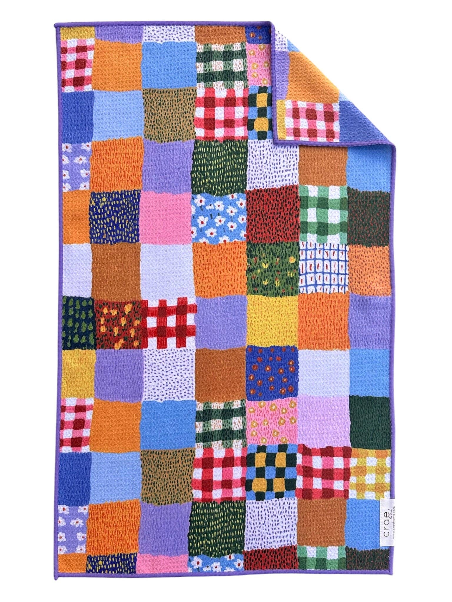 Crae Patchwork Quilt hand towel with colorful gingham, florals, dots, and abstract patchwork patterns.