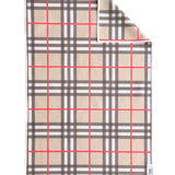 Tan plaid hand towel with bold black, white and red lines.