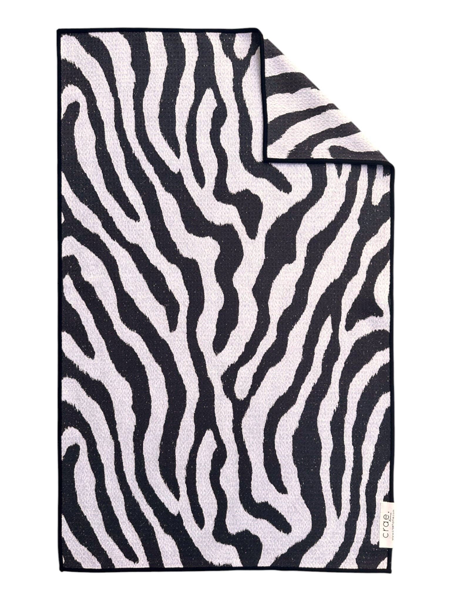 Crae Safari Stripe double-sided hand towel with bold black and white zebra print.
