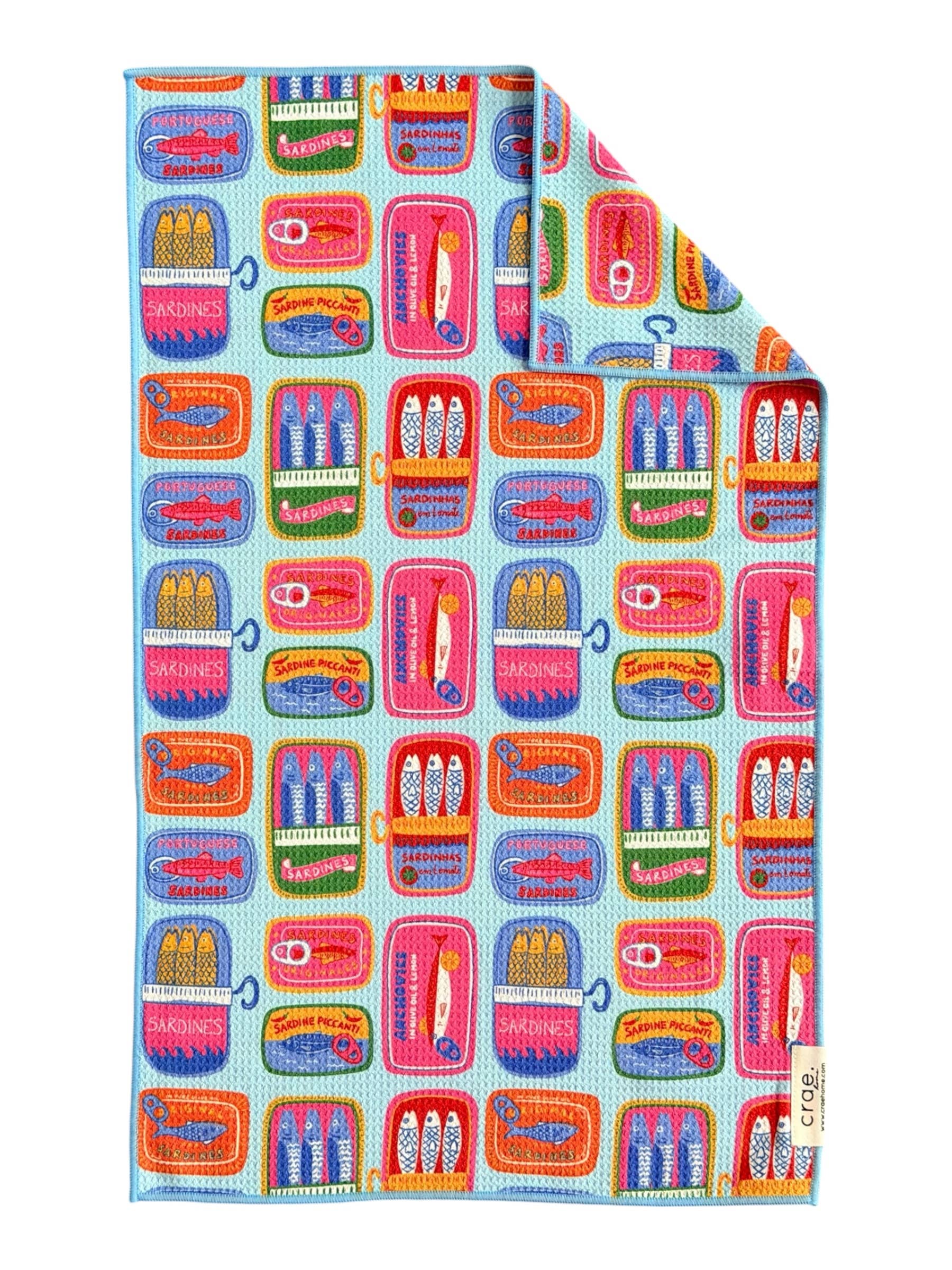 Sardine print double-sided microfiber hand towel with waffle weave texture.