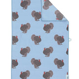 Blue double-sided hand towel with colorful allover turkey print.
