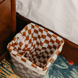 Brown and white checkered 4-gallon trash liners for small waste baskets.