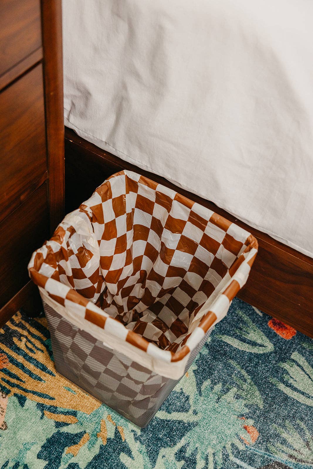 Brown and white checkered 4-gallon trash liners for small waste baskets.