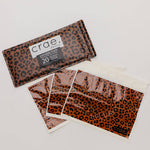 Crae Wild Cat peel-and-stick portable trash bags featuring a bold leopard print.