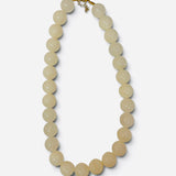 Chunky cream bubble bead necklace with glossy marbled finish and gold-tone clasp.