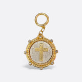 Gold cross medallion charm with textured silver background, crystal accents, and ring clasp for scarves or jewelry.