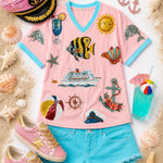 Pink V-neck top with nautical sequin designs and contrasting aqua trim.