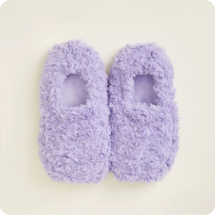 Curly purple Warmies slippers with plush faux fur and lavender scent.