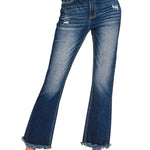Close view of high-rise cropped denim showcasing raw hem and subtle distressed details