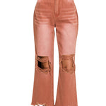 Rust colored distressed knee jeans with raw hemline