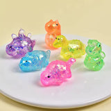 Colorful dinosaur squishy stress toy in assorted colors.