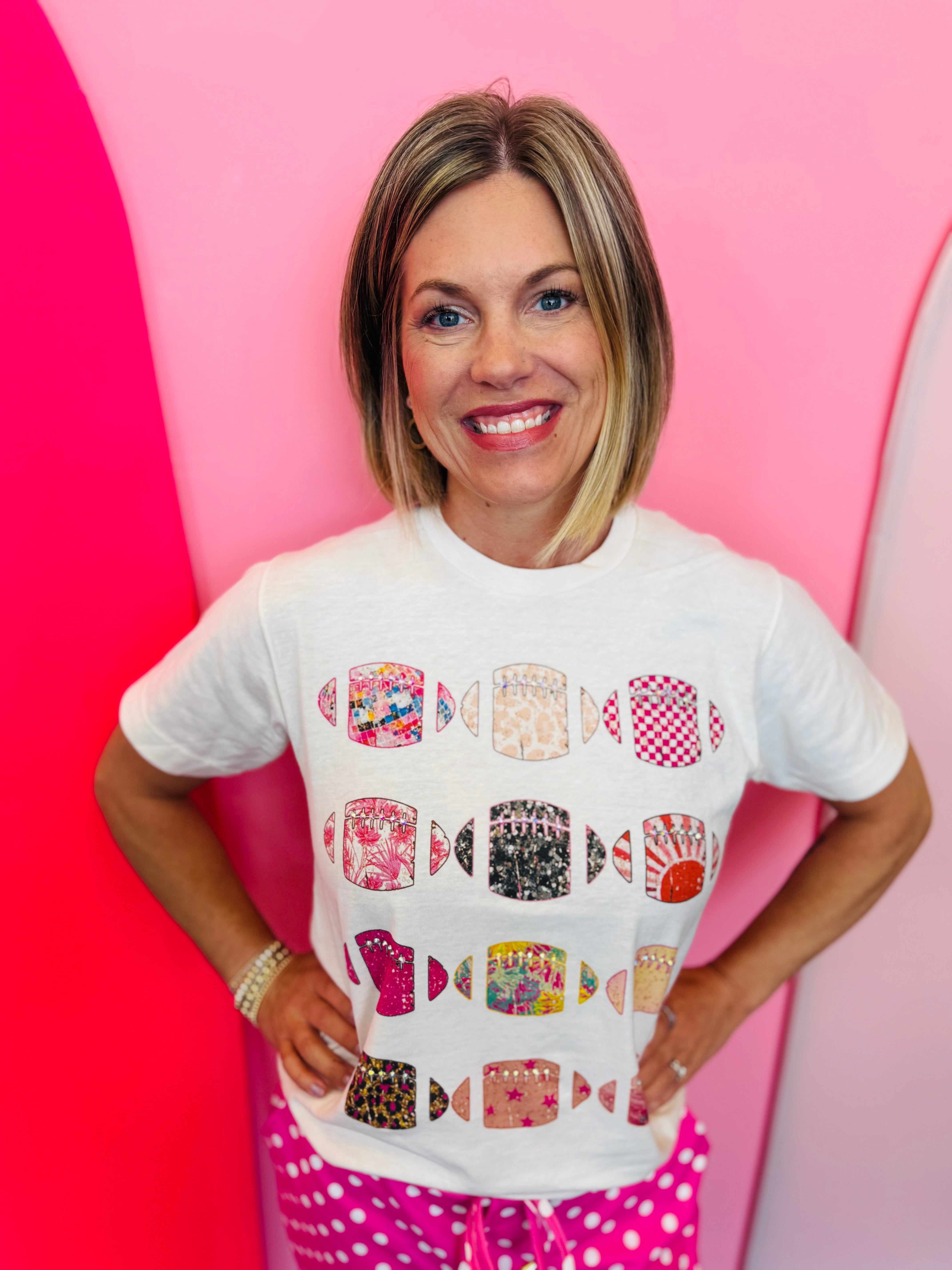 Colorful disco football graphic tee with leopard, floral, and checker details.