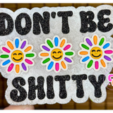 Don’t Be Shitty freshie with colorful flowers and playful saying.