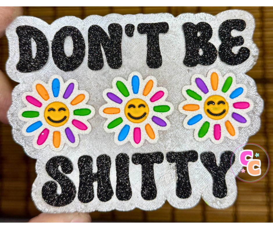 Don’t Be Shitty freshie with colorful flowers and playful saying.