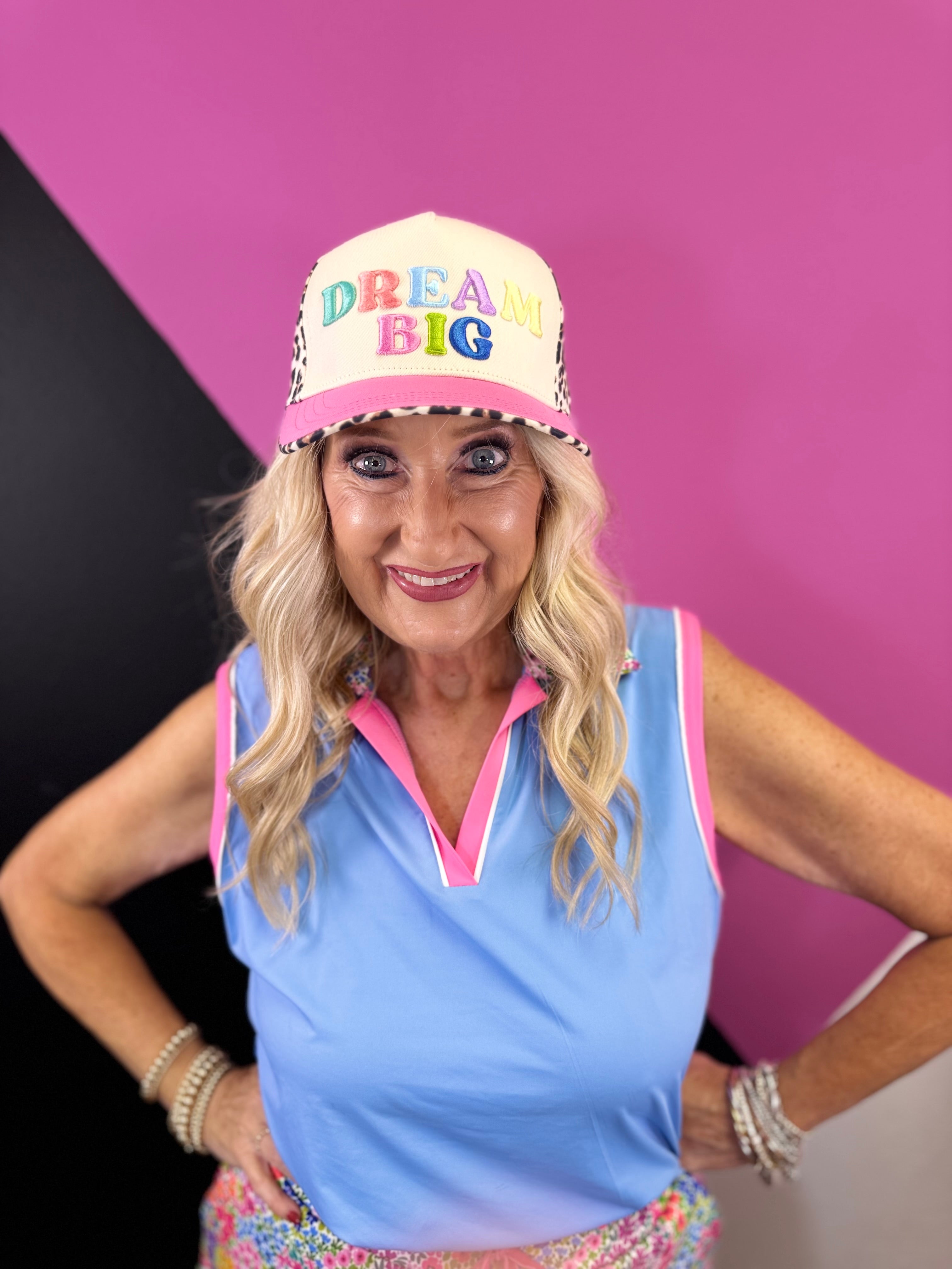 Pink, cream and leopard hat with colorful pastel puff embroidered Dream Big lettering.