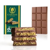 Luxury Dubai chocolate bar with pistachio cream and crispy kataifi layers in elegant packaging.