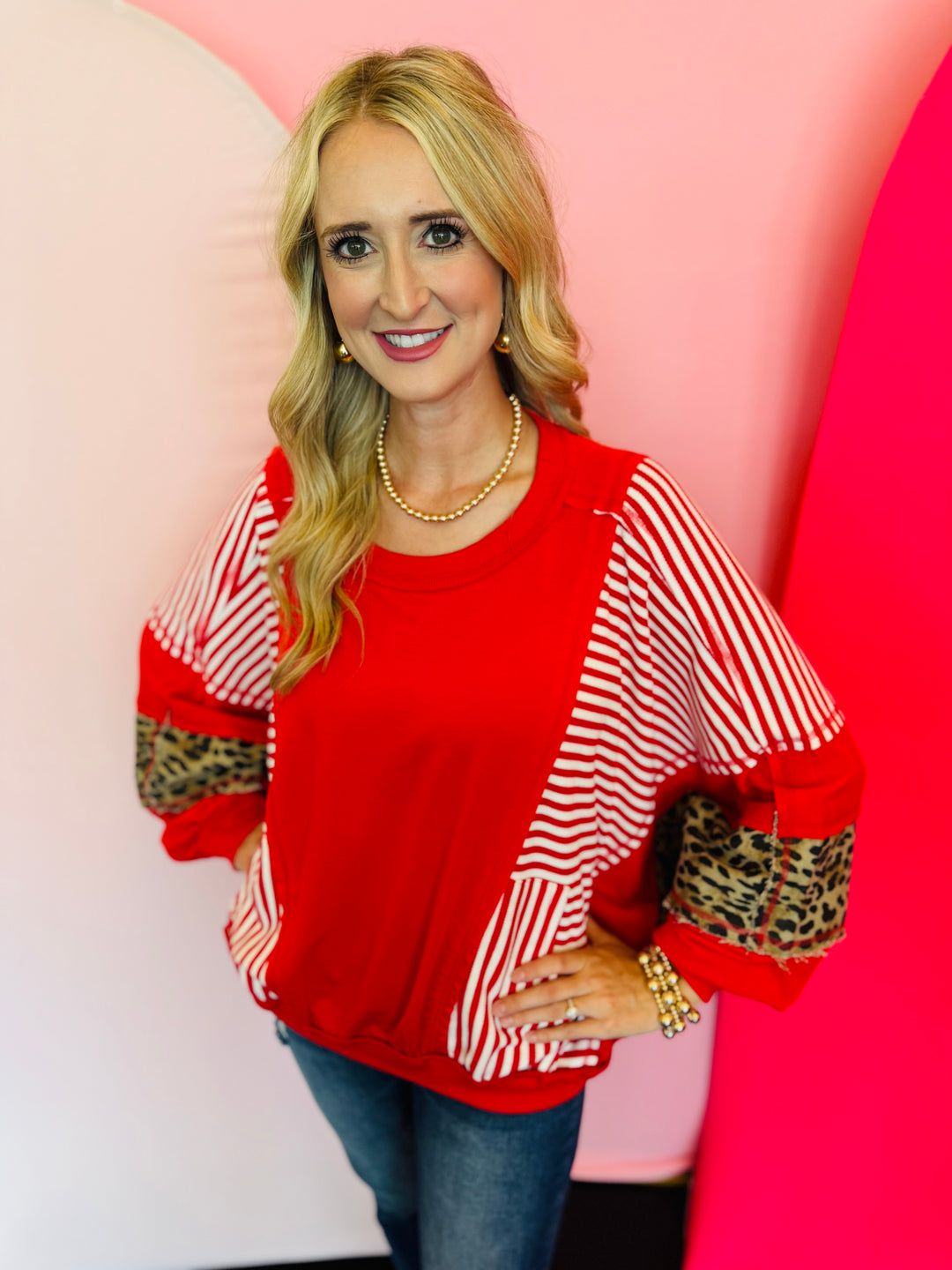 Red, stripe, and leopard oversized Dolman style long sleeve sweatshirt.