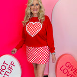 Red luxe pullover with oversized gingham heart patch and soft, stretchy comfortable fit.