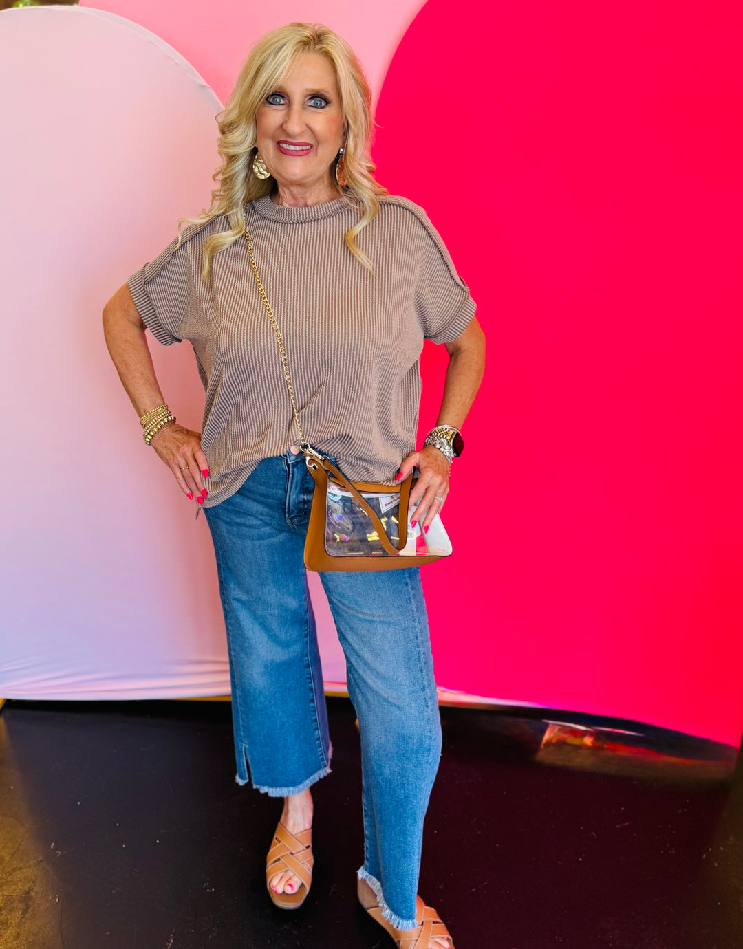 Full-body view of the Mocha Raised Ribbed Top styled with jeans, sandals, and a crossbody purse for a casual, everyday look.