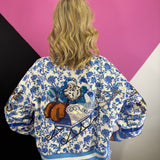Queen Of Sparkles Blue & White Floral Vintage Santa Sweatshirt