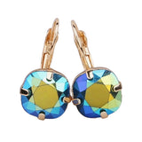 Gold tone drop earrings with faceted emerald AB gemstone and fishhook ear wire.
