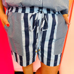 Navy striped shorts with elastic drawstring waist and mixed stripe panel detail