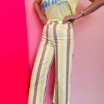 Sand striped straight leg pants with yellow tan cream stripes and pockets