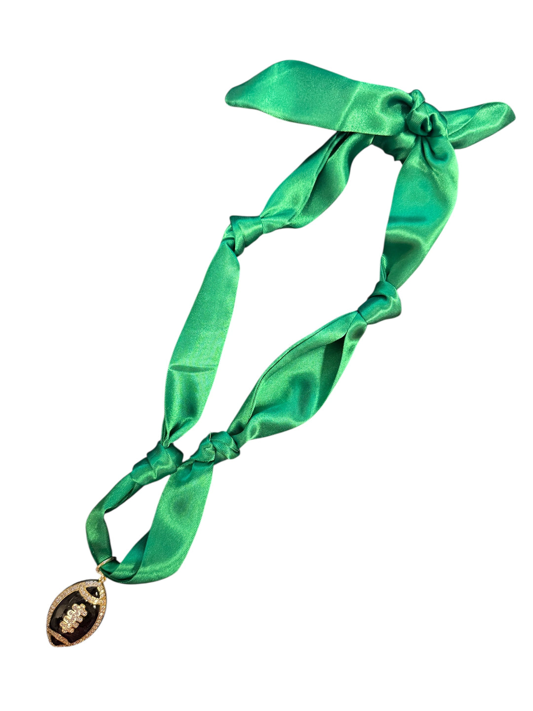 Green scarf necklace with football charm.