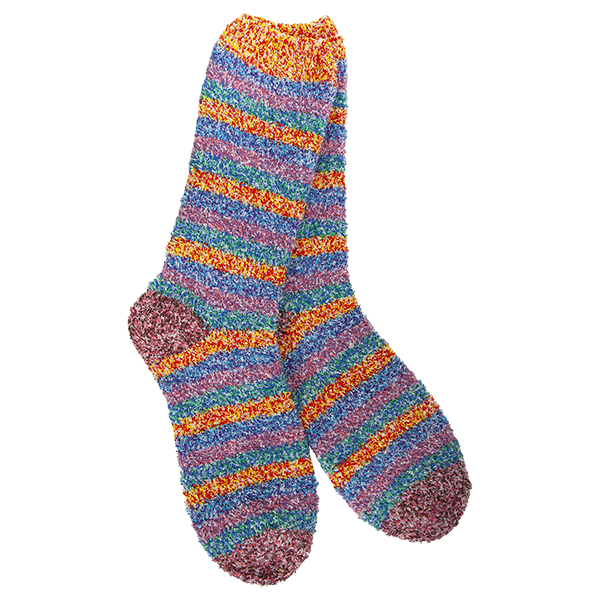 A pair of fuzzy, plush crew socks with a vibrant horizontal stripe pattern in bright, multi-colored rainbow stripes.