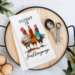 White cotton tea towel with three colorful chickens and witty farmhouse text design.
