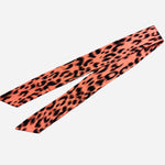 Coral animal print satin scarf tie, wearable as scarf, necklace, or purse twilly.