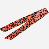 Coral animal print satin scarf tie, wearable as scarf, necklace, or purse twilly.