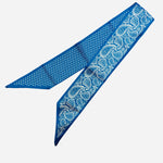 Royal blue polka dot and bandana reversible satin scarf tie styled as scarf or purse twilly.