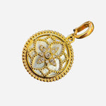 Floral Quatrefoil Medallion Charm with mother of pearl, Swarovski crystal center, and gold beaded border.