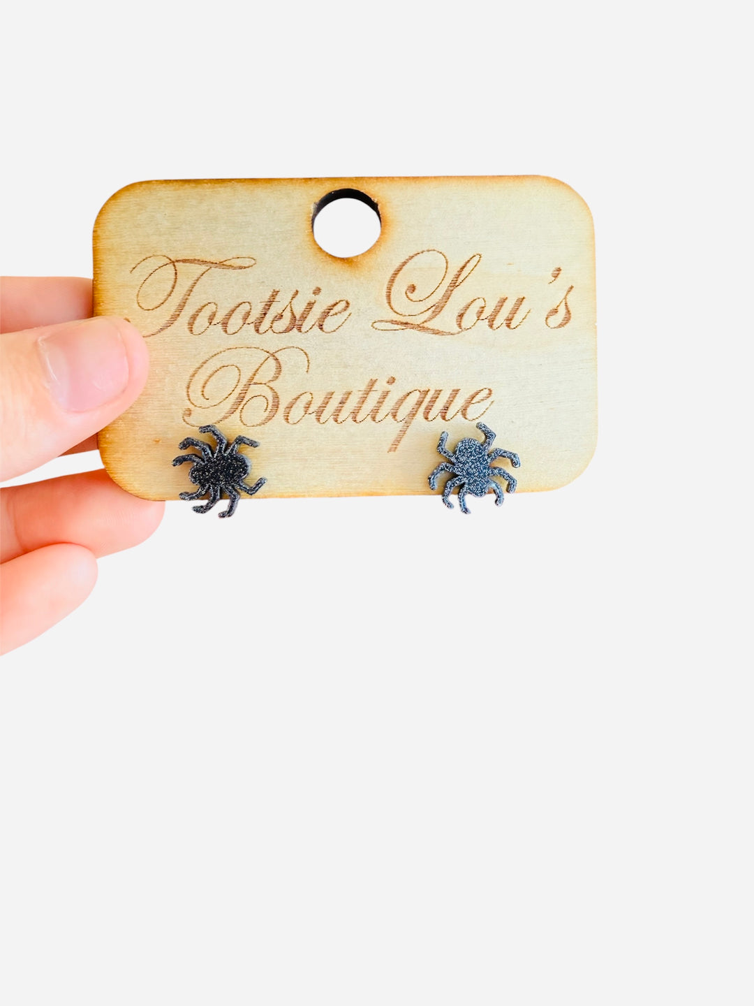 Black acrylic spider stud earrings. 