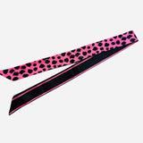 Hot pink leopard and black stripe reversible satin scarf tie styled as scarf or purse twilly.