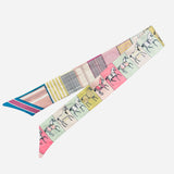 Pastel satin scarf with horses and colorblock stripes in pink, blue, mint, and chartreuse.