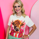 Cream Highland cow graphic tee with pink polka dot suit and crystal details.