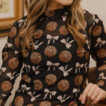 Leopard basketball and bow print mesh top with long sleeves, combining sporty and girly charm