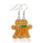 Lightweight acrylic gingerbread earrings with detailed icing and festive holiday design.