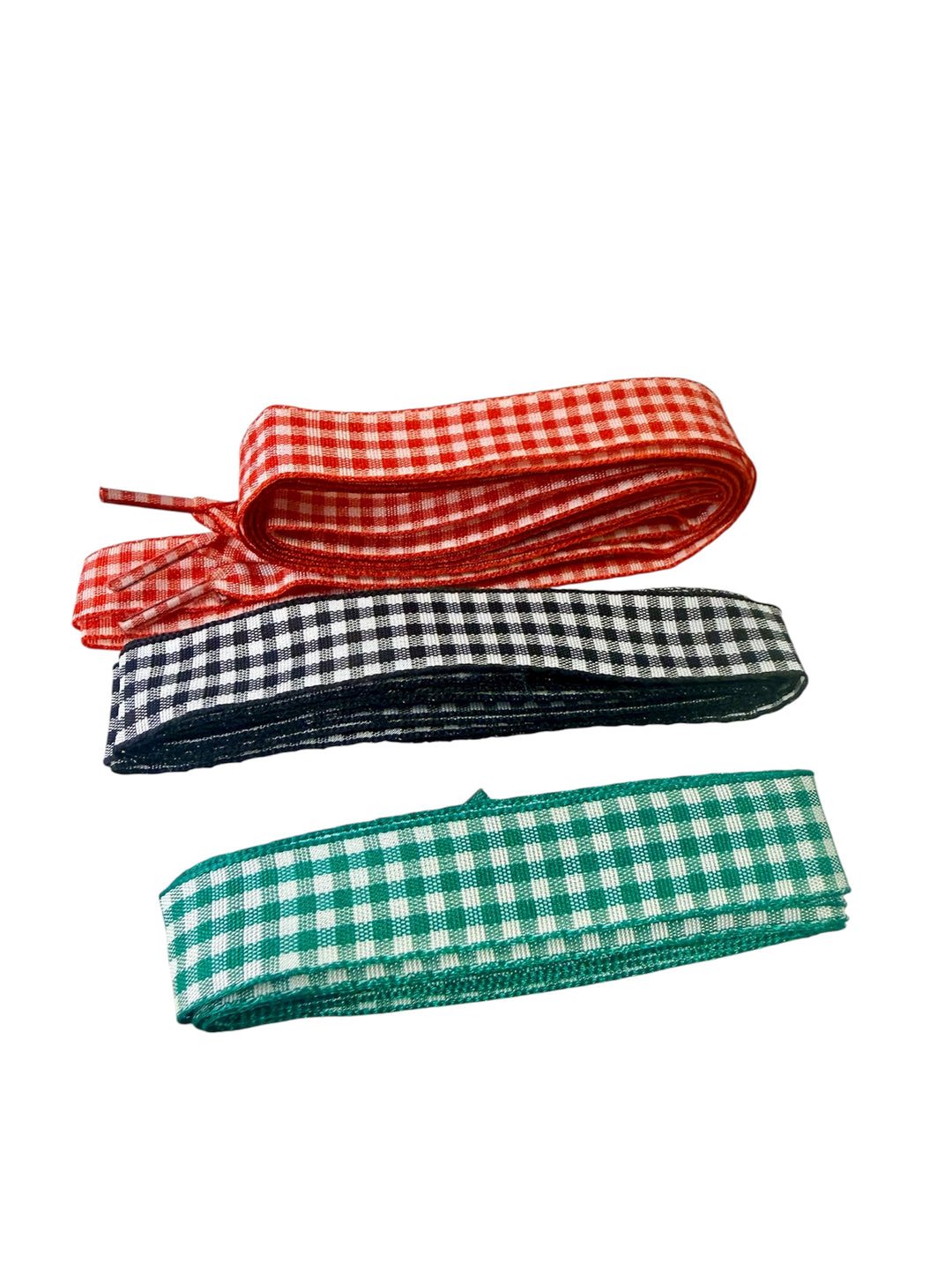 Gingham shoelaces in red, black, and green check patterns, stylish replacement laces for sneakers or boots.