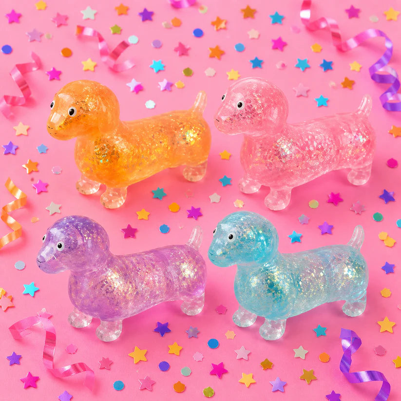Glitter-filled weenie dog squishy stress toy with sparkling sensory design.