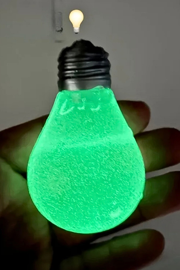 Glow-in-the-dark light bulb shaped squishy sensory fidget toy.