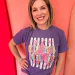 Purple retro graphic tee with God Is Good All The Time colorful lettering.