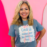 Blue graphic tee with faith message and pink bow accent