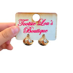 Gold dipped puffy hoop earrings with chunky polished finish.
