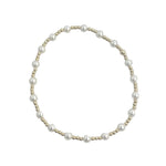 Gold filled and mother of pearl beaded bracelet with delicate stretch design.