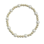 Gold filled and mother of pearl beaded bracelet with delicate patterned design.