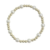 Gold filled and mother of pearl beaded bracelet with delicate patterned design.