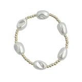 Gold filled and large pearl beaded bracelet with stretch fit and elegant design.